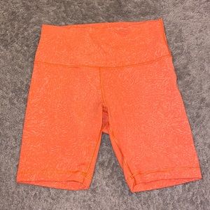 LULULEMON Orange Biker shorts size 6 Wunder